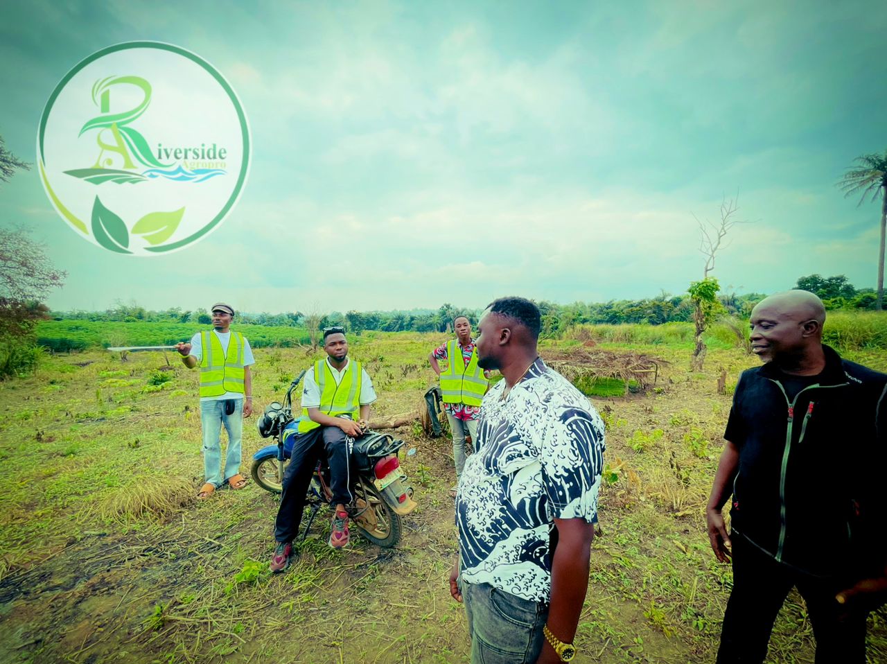 Farm staff at the edge of the plot